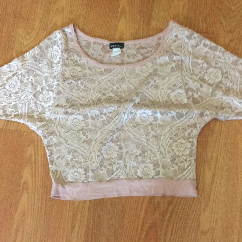 A cute cream/pink and see threw wet seal shirt